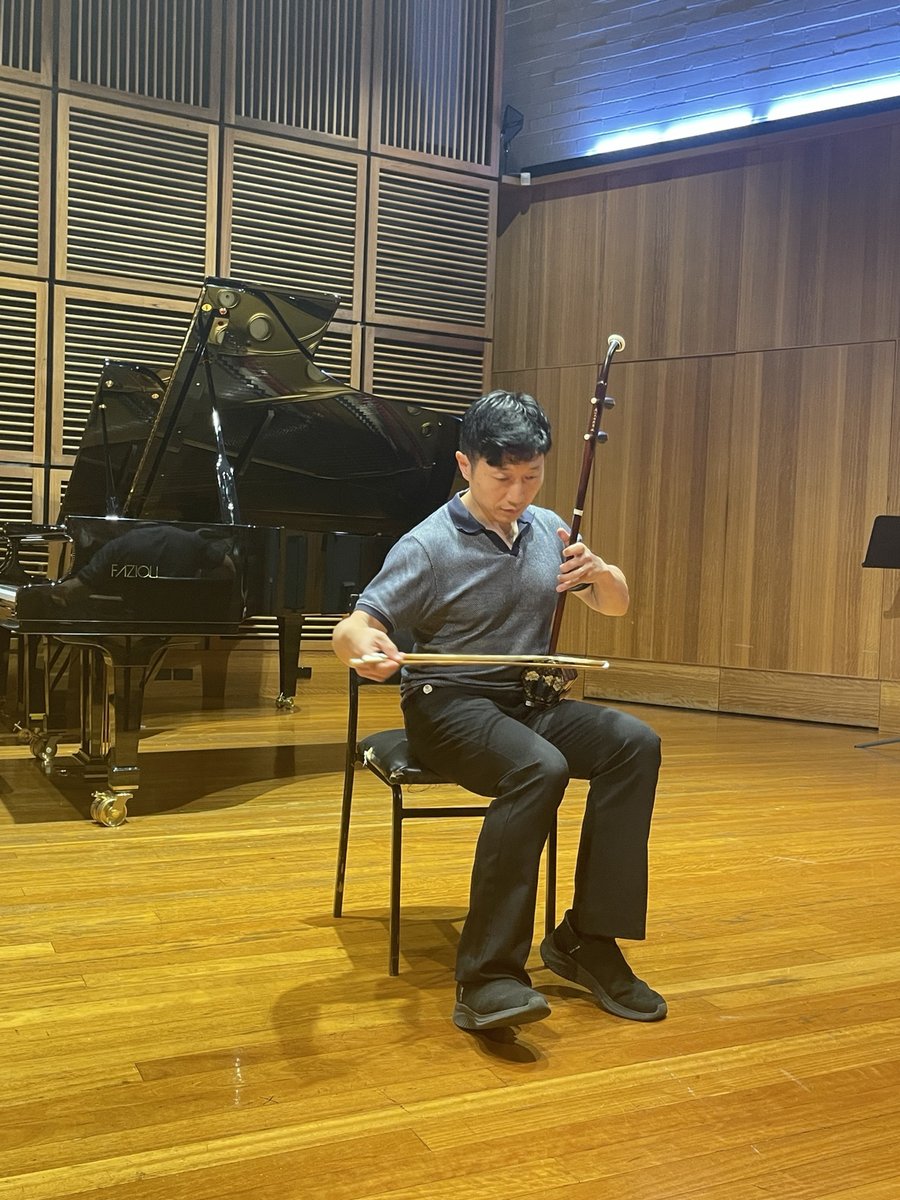 Erhu performer representing diverse musical traditions at the Festival